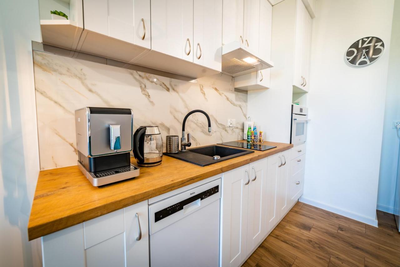 Apartamenty W Zatoce Mikołajki Bagian luar foto