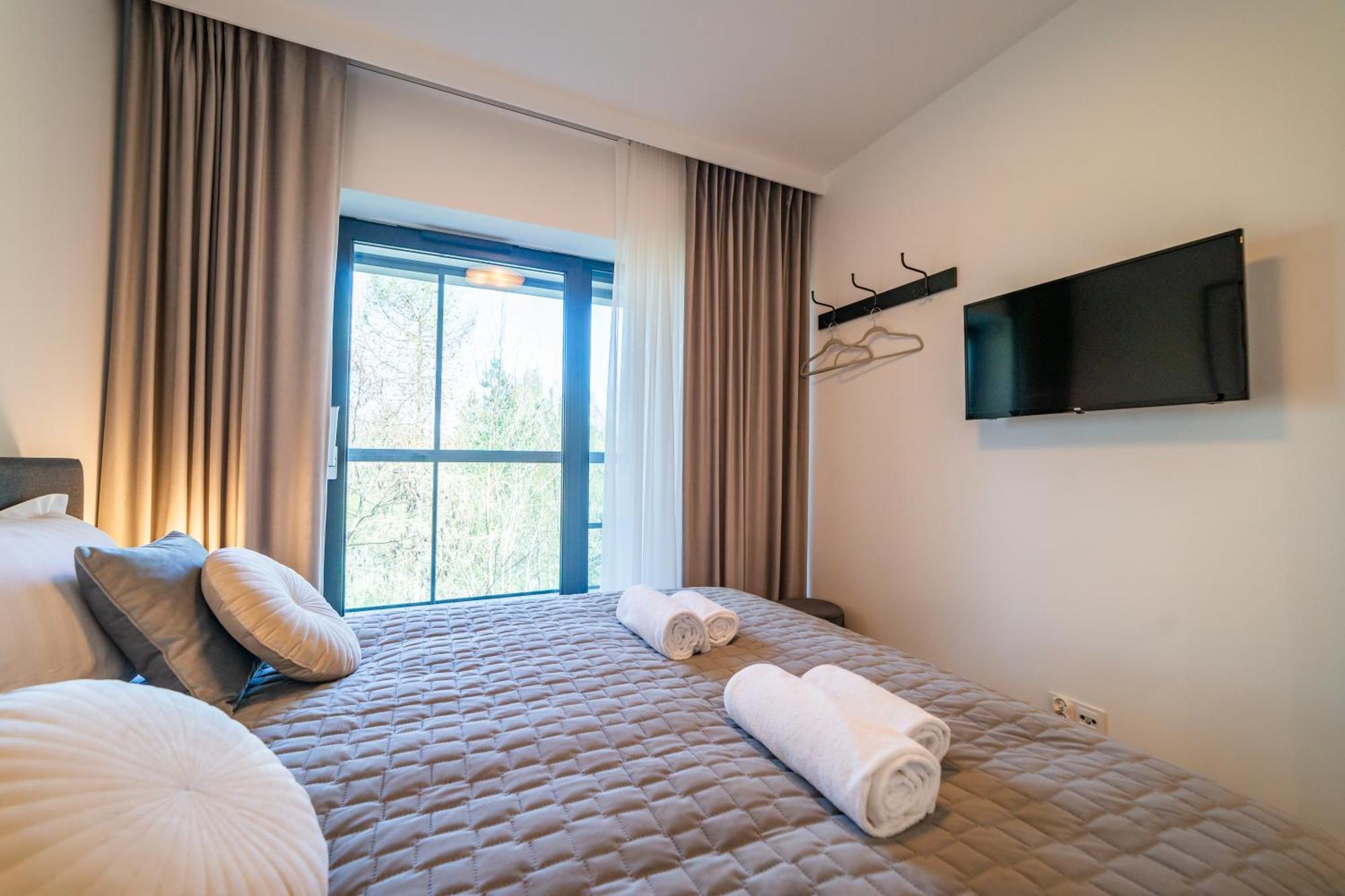 Apartamenty W Zatoce Mikołajki Bagian luar foto