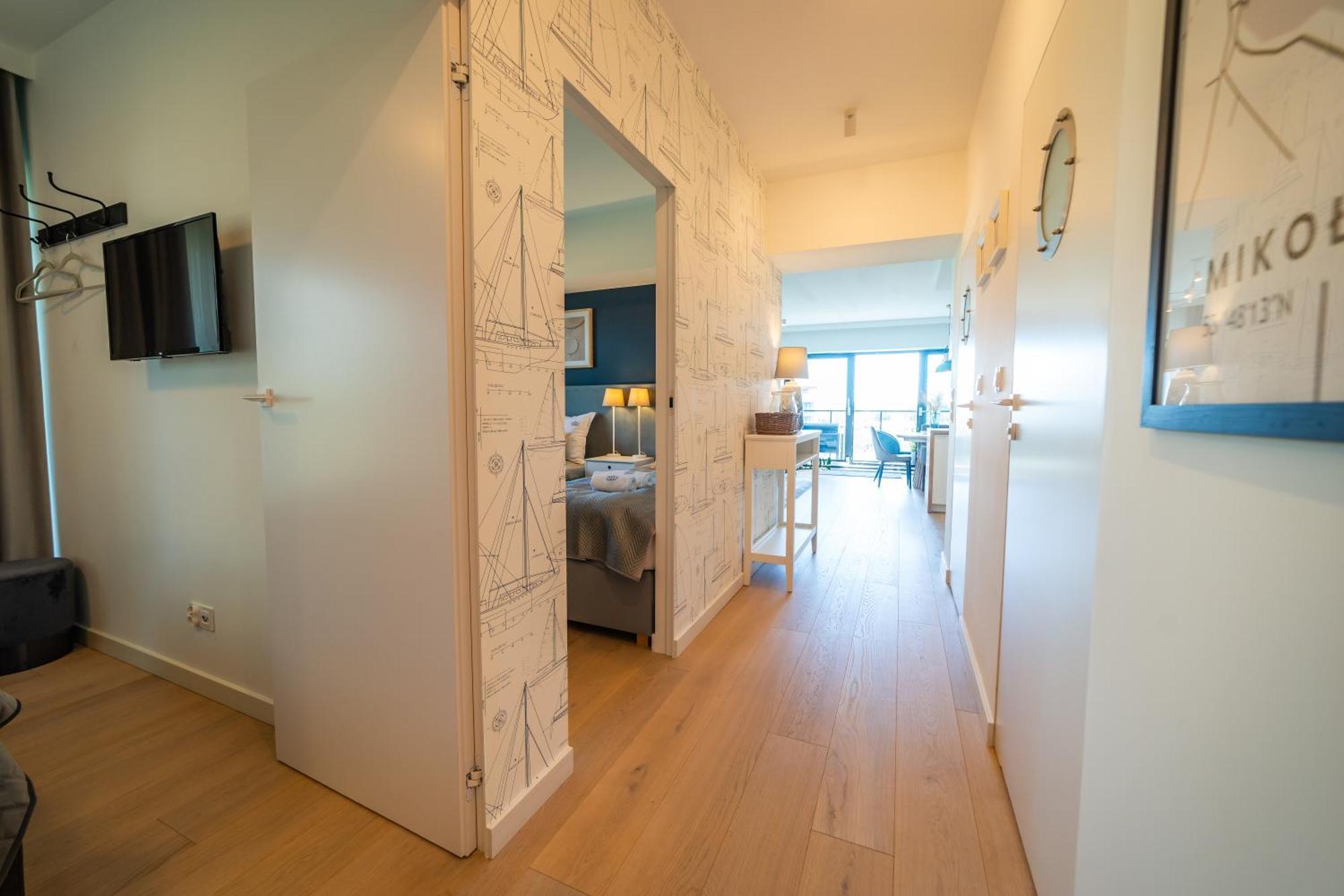 Apartamenty W Zatoce Mikołajki Bagian luar foto